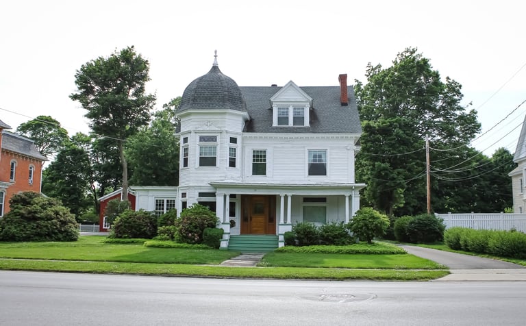 Historic white home with architectural detail
